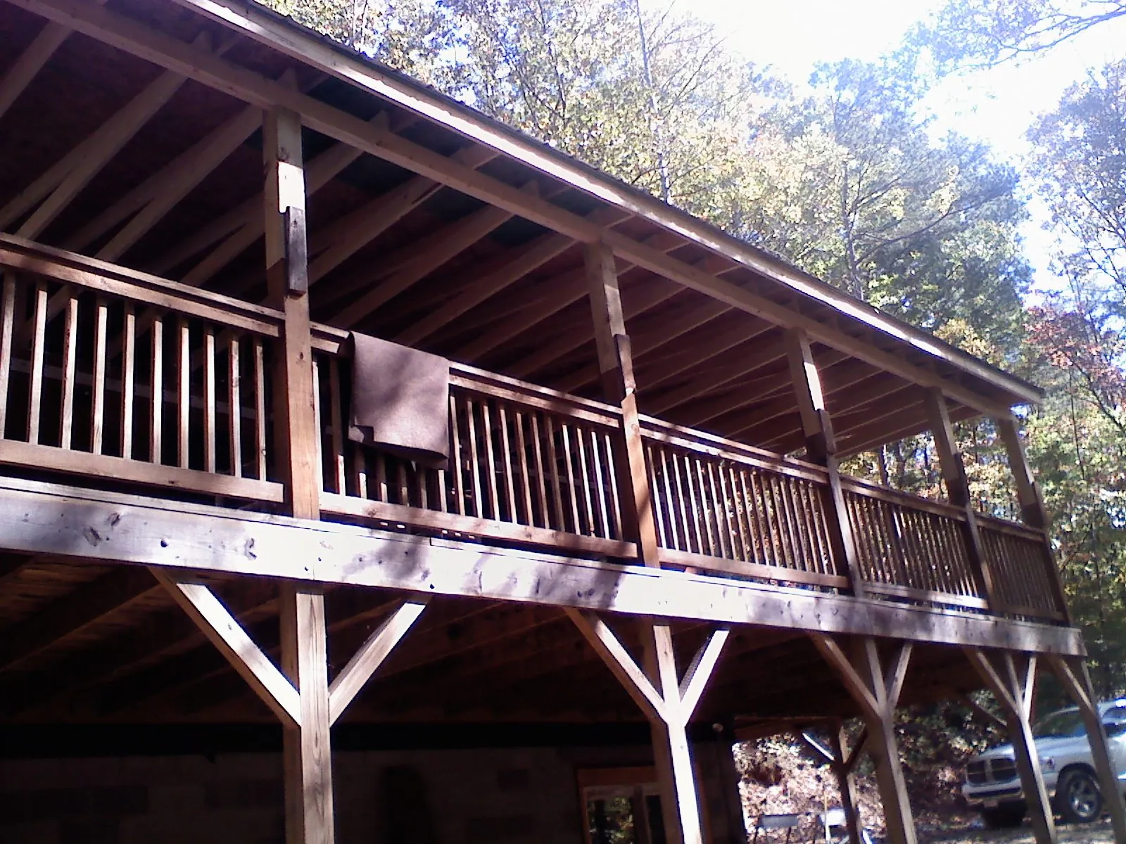 Timber framing under a new elevated porch and deck — Roof Leak Repair in Shreve by Roofing Brothers